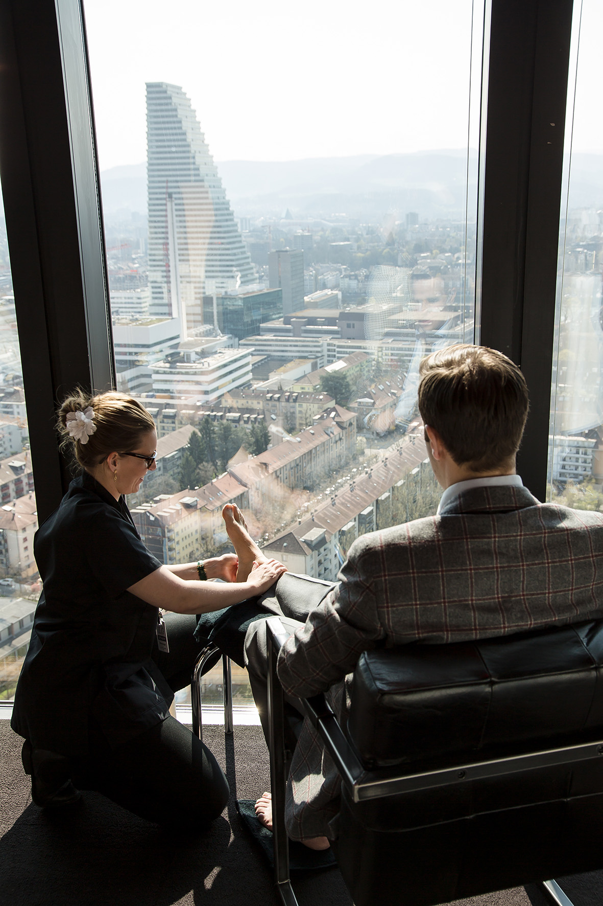 Exhausted watch executives were treated to a massage while looking down on Basel from the 31st floor.